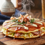Okonomiyaki: A Versátil Panqueca Japonesa Estilo Osaka
